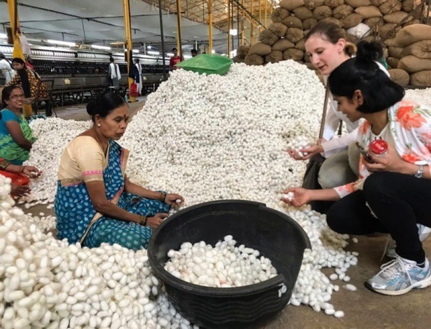 Anjani Nayak and Fabiola Neitzel visit a silk reeling factory during their trip to India (Credit: Team SWAP). Anjani Nayak and Fabiola Neitzel visit a silk reeling factory during their trip to India (Credit: Team SWAP).